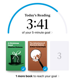 iPhone screen showing the Reading?Goals interface in the Books?app. At the top, there is a progress ring for a reading goal. Below the progress ring are three book covers. Beneath the book covers is text that one more book is needed to reach the 2024 goal of reading eight books.